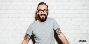 Thin Man with Glasses Facial Hair and Tattoos on his Upper Arms | Westfield Plastic Surgery Center Thin Man with Glasses Facial Hair and Tattoos on his Upper Arms